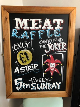 Chalkboard promoting Meat Raffle at The New Foresters