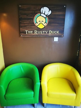 Logo painted to sign Bridgwater 'The Rusty Duck'