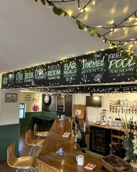 Long board created above the bar at The Bason Bridge Inn - East Huntspill