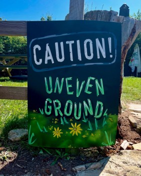 Uneven ground sign created at The Compass Tavern